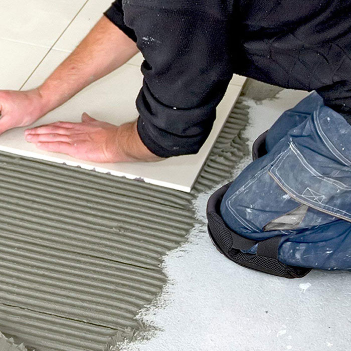 Tafts de genou pour travailler
